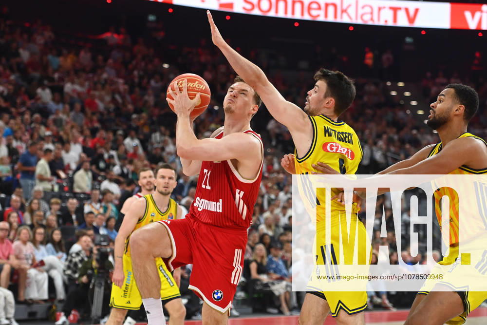 Justus HOLLATZ FCB , action,duel against Jonas MATTISSECK Alba Berlin , re Moses WOOD Berlin Basketball BBL,Season 2025 2026 Play Off Final Game 2, FC Bayern Muenchen Alba Berlin on 14 06 2026 S A P G A R D EN