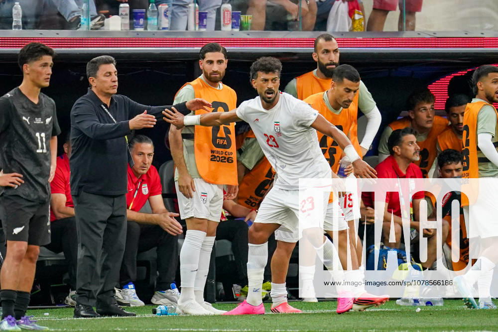USA Soccer 2026 FIFA World Cup Group Stage Group G Iran vs. New Zealand SoFi Stadium Inglewood, Los Angeles County, California Goal and goal celebration following the 1-1 equalizer by Ramin Rezaeian (Iran 23), who runs toward coach Amir Ardeshir Ghalenoy to celebrate the goal,detected_source_language