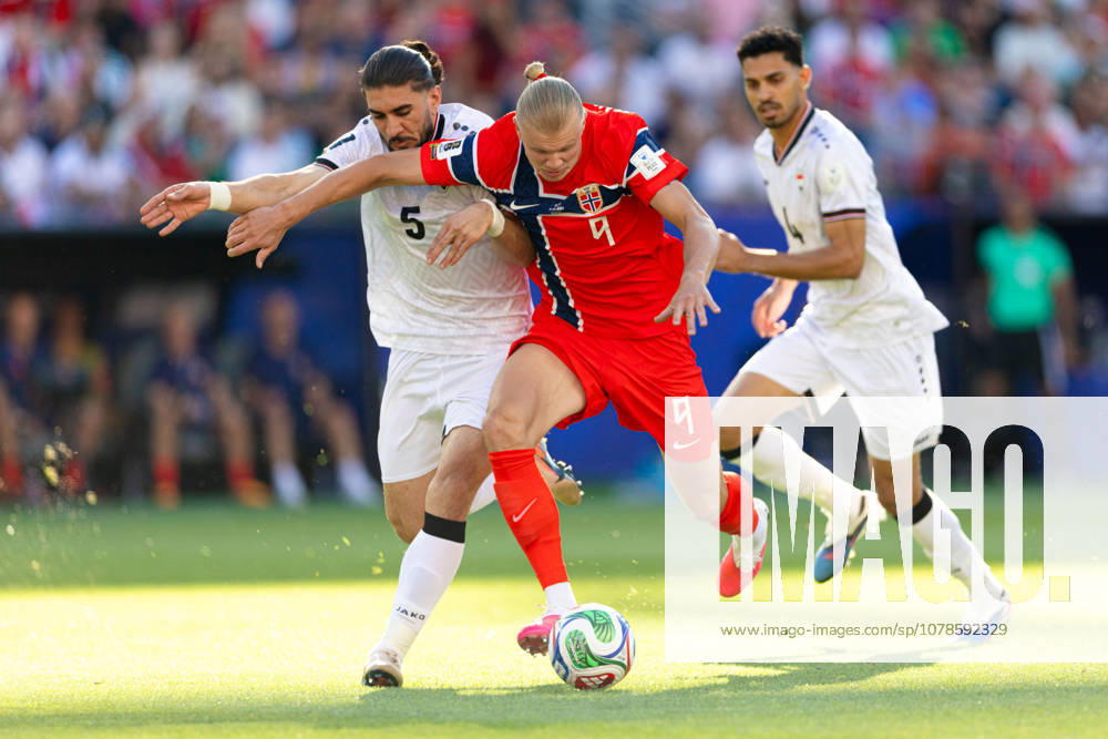 Foxborough, Massachusetts, USA; Norway forward Erling Haaland (9) holds off Iraq defender Akam Hashim (5) in a FIFA World Cup, WM, Weltmeisterschaft, Fussball 2026 Group I match between Iraq and Norway at Boston Stadium. (c) CSM - ZUMAc04_ 20260616_zma_c04_131