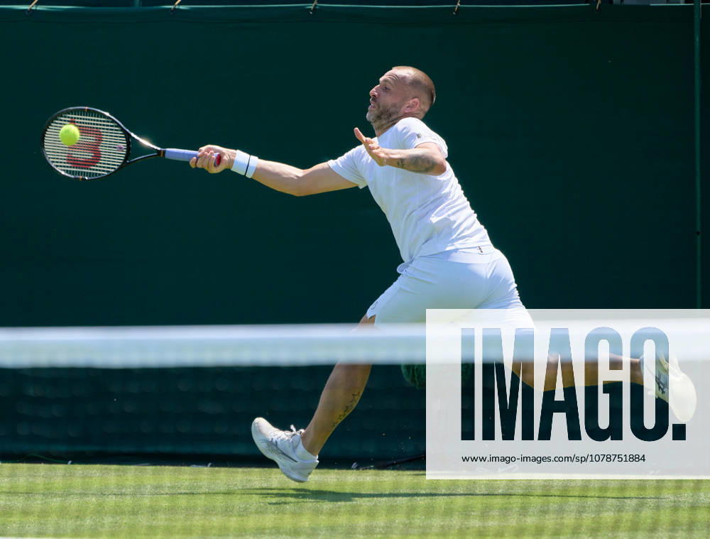 2026 Wimbledon, June 22, qualifiers LONDON, - JUNE 22: Dan Evans in his final Wimbledon plays a full stretch forehand during the 2026 Wimbledon, June 22, qualifiers at The all England clubs facility at the Community Sports Centre Roehampton on June 22, 2026 in London, GBR. London The all England club, Wimbledon GBR