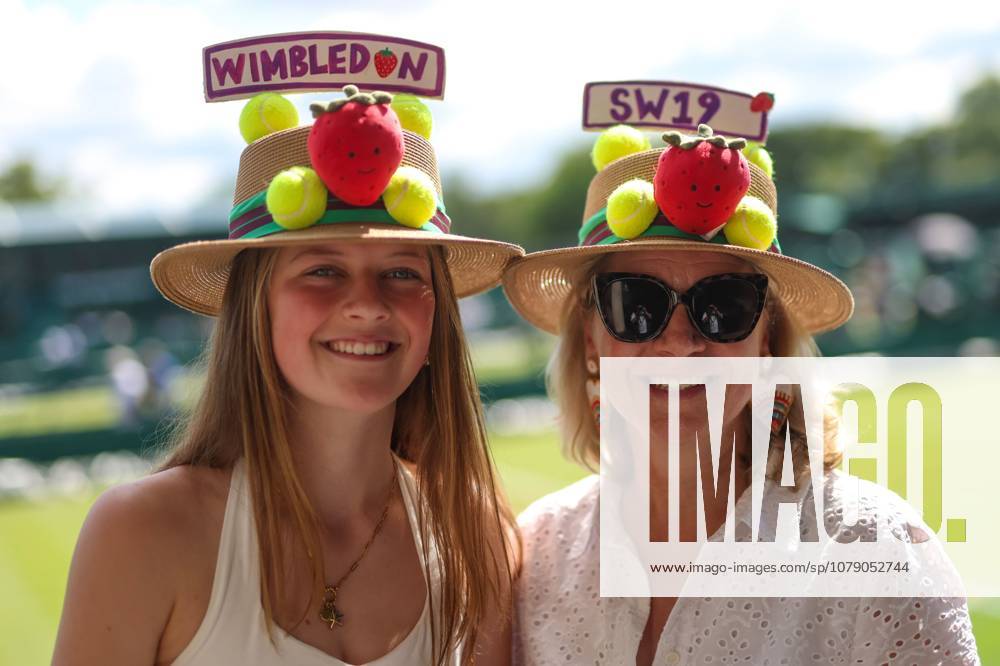 Attendees wear strawberry tennis hats ahead of Day 3 Wimbledon Tennis Championships, Day 3, The All England Lawn Tennis and Croquet Club, London, UK - 01 Jul 2026London The All England Lawn Tennis and United Kingdom