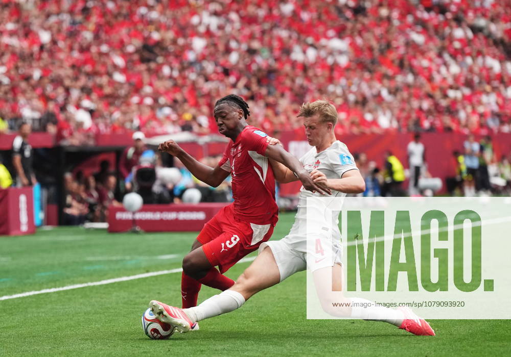 Canada s Luc de Fougerolles (4) takes the ball away from Switzerland s Johan Manzambi (9) during the first half of a World Cup Group B soccer match, in Vancouver, on Wednesday, June 24, 2026. Canada News - June 24, 2026 - ZUMAc35_ 20260624_zaf_c35_351