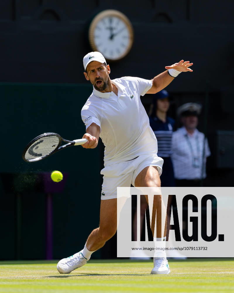 Novak Djokovic (SRB) in action during his match against Arthur Rinderknech (FRA) in the 2026 Wimbledon Championships at the AELTC London London All England Lawn Tennis and Croquet Club Wimbledon England, UK NEWSPAPERS OUT