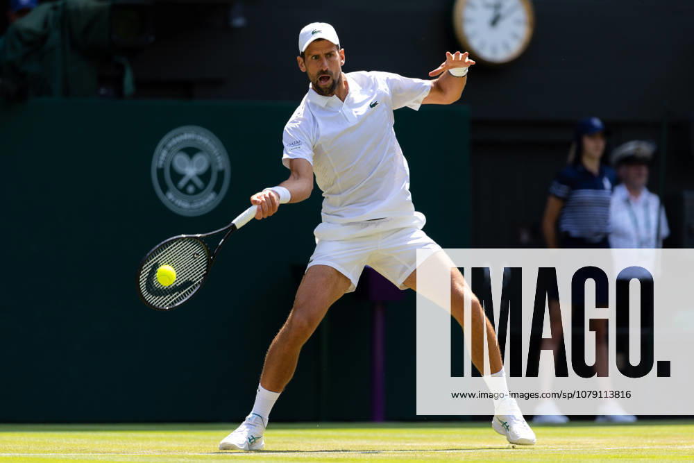 Novak Djokovic (SRB) in action during his match against Arthur Rinderknech (FRA) in the 2026 Wimbledon Championships at the AELTC London London All England Lawn Tennis and Croquet Club Wimbledon England, UK NEWSPAPERS OUT