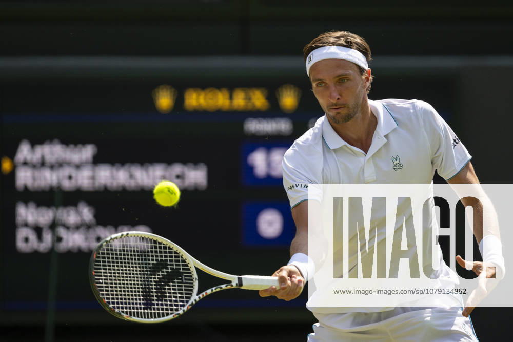 (260704) -- LONDON, July 4, 2026 -- Arthur Rinderknech of France returns the ball during the men s singles third round match against Novak Djokovic of Serbia at the Wimbledon Tennis Championships in London, Britain, on July 3, 2026. (Photo by Xinhua) (SP)BRITAIN-LONDON-TENNIS-WIMBLEDON-MEN S SINGLES StephenxChung