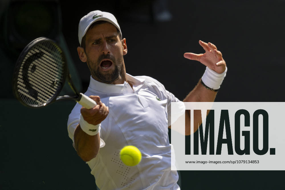 (260704) -- LONDON, July 4, 2026 -- Novak Djokovic of Serbia returns the ball during the men s singles third round match against Arthur Rinderknech of France at the Wimbledon Tennis Championships in London, Britain, on July 3, 2026. (Photo by Xinhua) (SP)BRITAIN-LONDON-TENNIS-WIMBLEDON-MEN S SINGLES StephenxChung