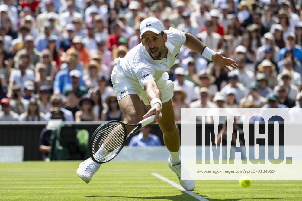 (260704) -- LONDON, July 4, 2026 -- Novak Djokovic of Serbia returns the ball during the men s singles third round match against Arthur Rinderknech of France at the Wimbledon Tennis Championships in London, Britain, on July 3, 2026. (Photo by Xinhua) (SP)BRITAIN-LONDON-TENNIS-WIMBLEDON-MEN S SINGLES StephenxChung