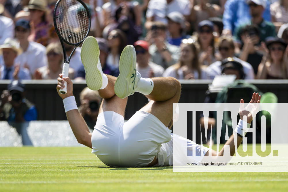 (260704) -- LONDON, July 4, 2026 -- Novak Djokovic of Serbia falls during the men s singles third round match against Arthur Rinderknech of France at the Wimbledon Tennis Championships in London, Britain, on July 3, 2026. (Photo by Xinhua) (SP)BRITAIN-LONDON-TENNIS-WIMBLEDON-MEN S SINGLES StephenxChung