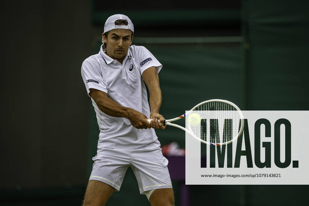 4th July 2026; All England Lawn Tennis and Croquet Club, London, England; Wimbledon Tennis Tournament, Day Six; Zachary Svajda (USA) plays a backhand in his third round match against Alex De Minaur (AUS) GodfreyxPitt