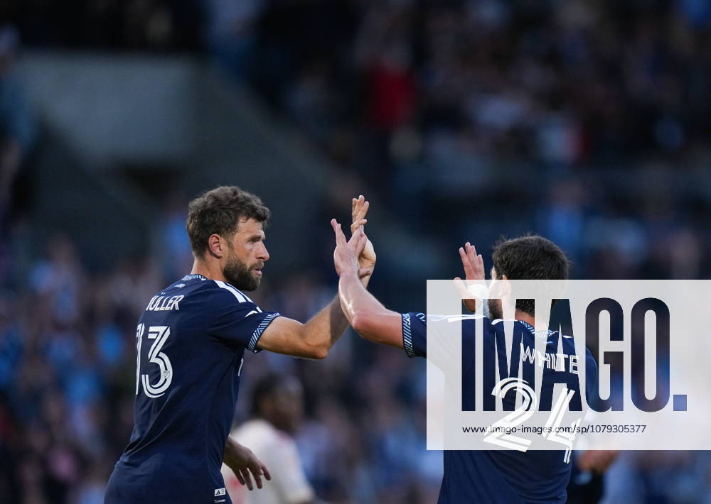 Vancouver Whitecaps Thomas Muller (13) and Brian White (24) celebrate Muller s goal during the second half of a Canadian Championship quarterfinal soccer match against Cavalry FC, in Burnaby, B.C., on Wednesday, July 8, 2026. Canada News - July 8, 2026 - ZUMAc35_ 20260708_zaf_c35_086
