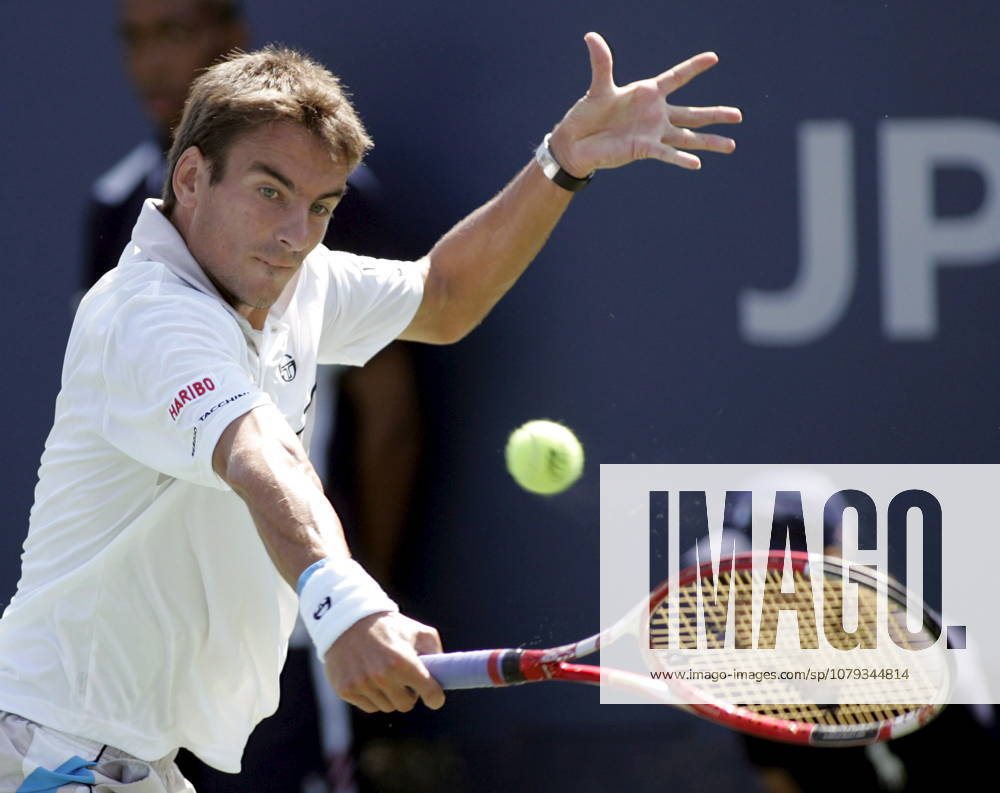 USA US OPEN TENNIS Tommy Robredo of Spain hits a backhand return epa000516183 Tommy Robredo of Spain hits a backhand return to Gustavo Kuerten of Brazil during their second round match on day four of the 2005 US Open Tennis Tournament at the US Tennis Center in Flushing Meadows, New York Thursday 01 September 2005. NEW YORK United States