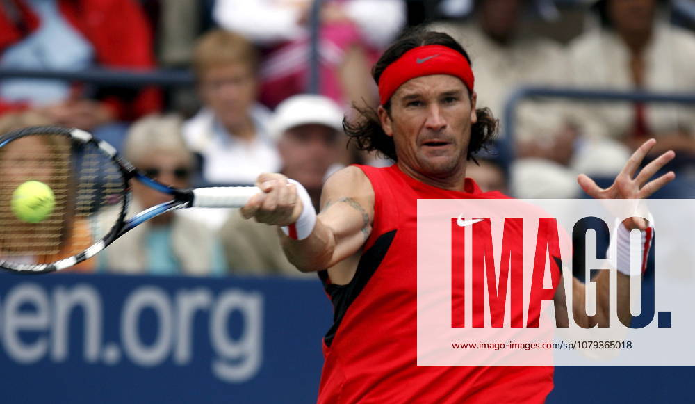 USA TENNIS US OPEN US OPEN TENNIS TOURNAMENT epa00806869 Carlos Moya of Spain hits a forehand return to Paul-Henri Mathieu of France during their second round match on the fifth day of the 2006 US Open tennis tournament in Flushing Meadows, New York Friday, 01 September 2006. FLUSHING MEADOWS United States