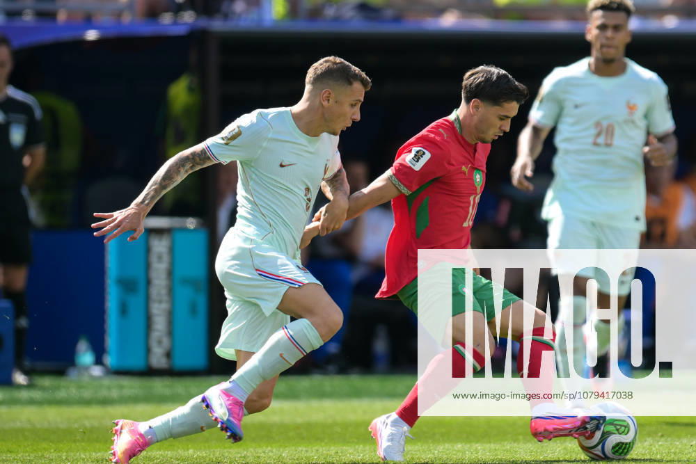 Soccer, 2026 World Cup, 20260709, France vs. Morocco. Pictured from left: Lucas DIGNE (France, 3) and Brahim DÃ u008DAZ (Morocco, 10) in a tackle for the ball at Foxborough Stadium in Boston, Massachusetts, United States of America