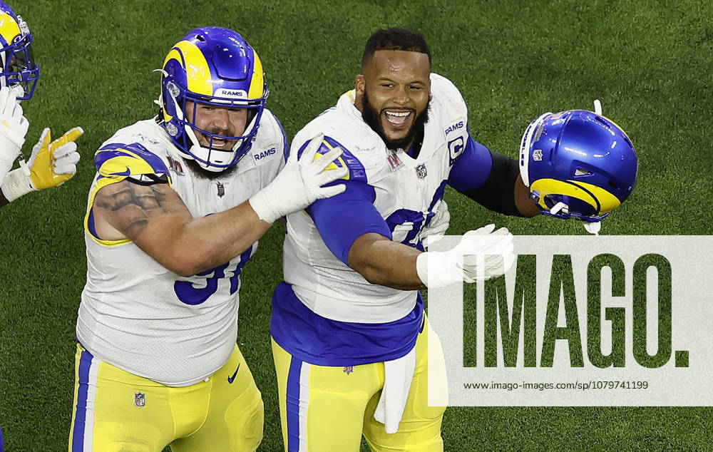 USA AMERICAN FOOTBALL SUPER BOWL LVI Los Angeles Rams at Cincinnati Bengals epa09754439 Los Angeles Rams Greg Gaines (L) and Aaron Donald (R) celebrate after stopping the Cincinnati Bengals on fourth down with second left in Super Bowl LVI at SoFi Stadium in Inglewood, California, USA, 13 February 2022. The annual Super Bowl is the Championship game of the NFL, American Football Herren, USA between the AFC Champion and the NFC Champion and has been held every year since January of 1967. Inglewood United States