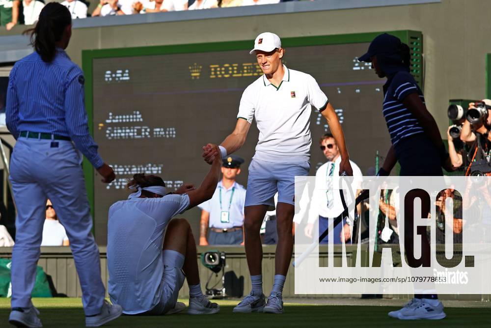 Alexander Zverev is helped to his feet by Jannik Sinner after slipping during the Men s Singles final Wimbledon Tennis Championships, Day 14, The All England Lawn Tennis and Croquet Club, London, UK - 12 Jul 2026London The All England Lawn Tennis and United Kingdom
