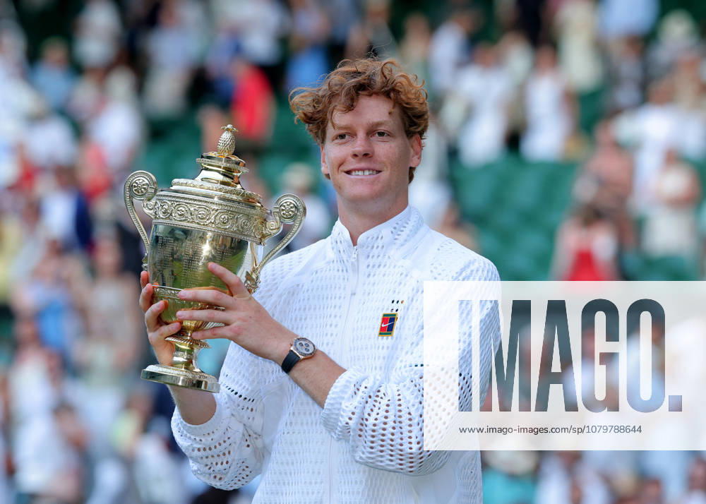 12th July 2026; All England Lawn Tennis and Croquet Club, London, England; Wimbledon Tennis Tournament, Final Day; Jannik Sinner (ITA) celebrates lifting the Gentlemens Singles Trophy for the 2nd time back to back after defeating Alexander Zverev (GER) JohnxPatrickxFletcher