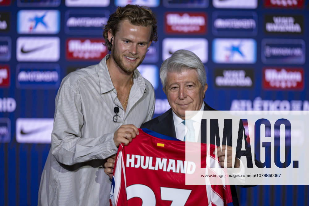 Morten Hjulmand unveiling as new player of Atletico de Madrid Morten Hjulmand (L) poses for a photo showing the club shirt with Enrique Cerezo (R) during his unveiling as new player of Atletico de Madrid at Estadio Riyadh Air Metropolitano on July 13, 2026 in Madrid, Spain. Madrid Estadio Riyadh Air Metropolitano Madrid Spain