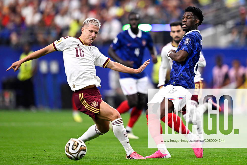 2026-07-14 France v Spain - Semi Final - FIFA World Cup, WM, Weltmeisterschaft, Fussball 2026 ARLINGTON, UNITED STATES - JULY 14: Dani Olmo of Spain, Aurelien Tchouameni of France during the Semi Final - FIFA World Cup 2026 match between France and Spain at Dallas Stadium on July 14, 2026 in Arlington, Texas. (Photo by Pablo Morano BSR Agency) Arlington United States Content not available for redistribution in The Netherlands directly or indirectly through any third parties.