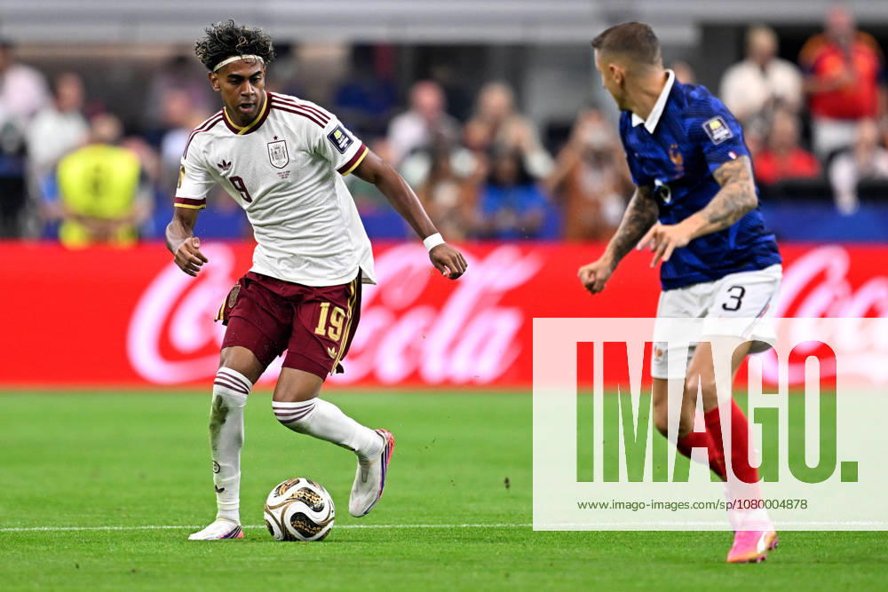 2026-07-14 France v Spain - Semi Final - FIFA World Cup, WM, Weltmeisterschaft, Fussball 2026 ARLINGTON, UNITED STATES - JULY 14: Lamine Yamal of Spain, Lucas Digne of France during the Semi Final - FIFA World Cup 2026 match between France and Spain at Dallas Stadium on July 14, 2026 in Arlington, Texas. (Photo by Pablo Morano BSR Agency) Arlington United States Content not available for redistribution in The Netherlands directly or indirectly through any third parties.