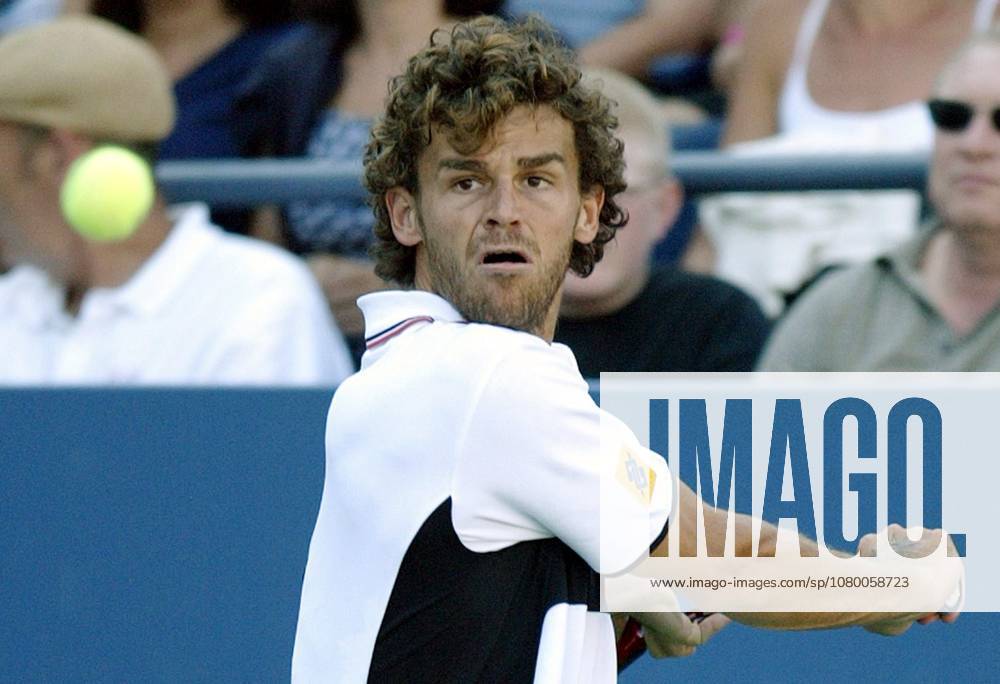 USA TENNIS US OPEN Gustavo Kuerten of Brazil epa000267116 Gustavo Kuerten of Brazil eyes the ball in his match against Kristian Pless of Denmark at the US Open in Flushing Meadows, New York Wednesday 01 September 2004.Pless defeated the 20th seeded Kuerten 6-4, 3-6, 6-1, 7-6. FLUSHING MEADOWS United States