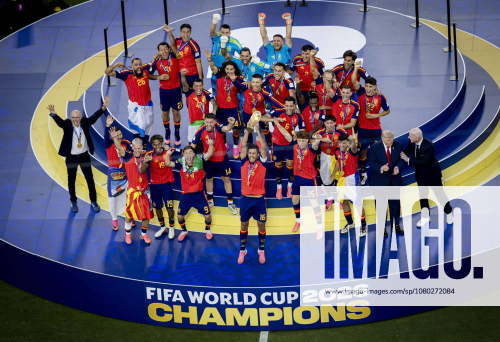New York, USA, July 19, 2026: Rodri lifts the trophy as Donald Trump and FIFA President Gianni Infantino watch the Spain vs. Argentina World Cup Final