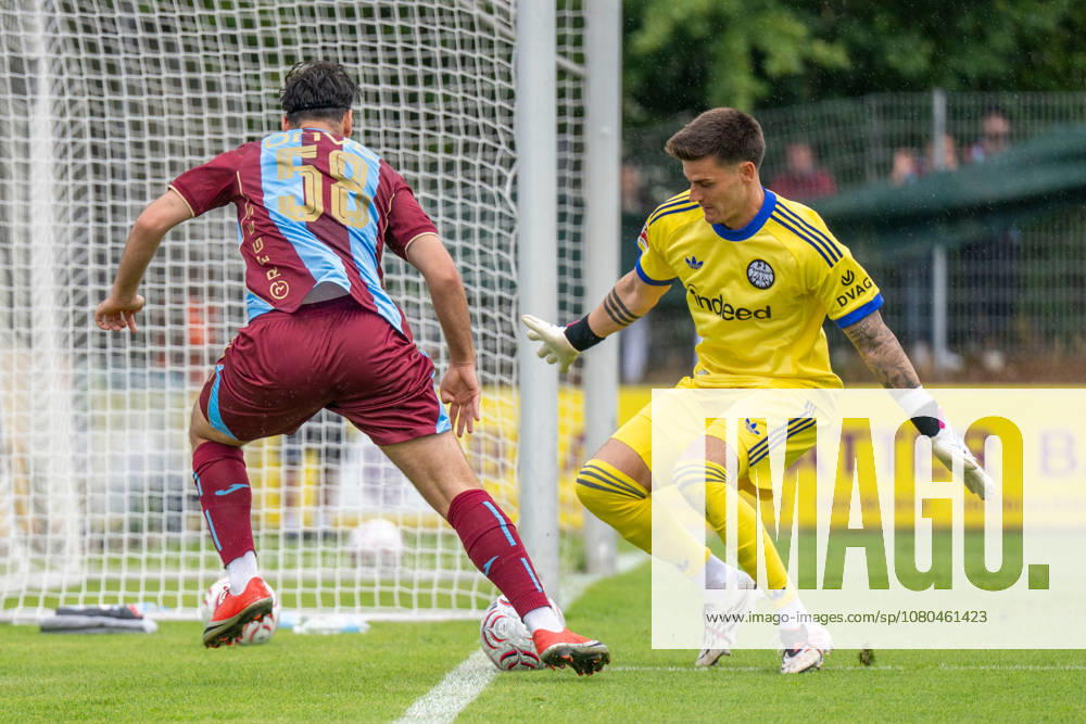 SOCCER - Frankfurt vs Trabzonspor, test match SALZBURG,AUSTRIA,26.JUL.26 - SOCCER - 1. DFL, 1. Deutsche Bundesliga, Sueper Lig, Eintracht Frankfurt vs Trabzonspor Kuluebue, test match. Image shows Aral Simsir (Trabzonspor) and Michael Zetterer (Frankfurt). GEPAxpictures xWolfgangxKofler
