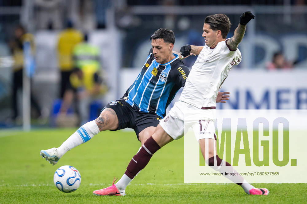 30th July 2026; Arena do Gremio Stadium, Porto Alegre, Brazil; Copa Sudamericana Football, Gremio versus Bolivar; Cristian Pavon of Gremio battles for possession with Patito Rodriguez of Bolivar RichardxDucker DiaEsportivo