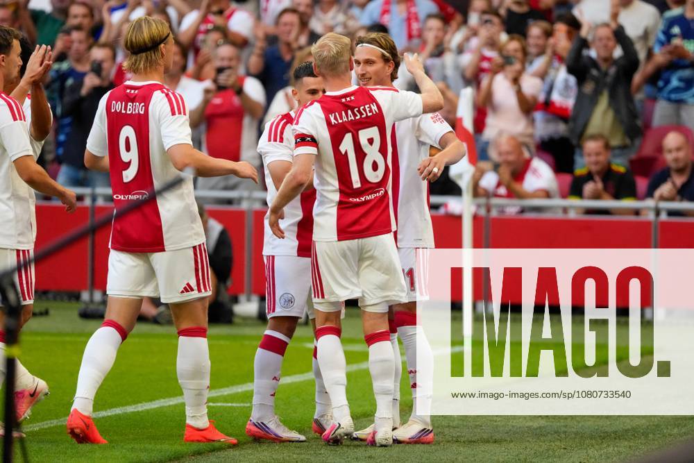 AMSTERDAM , 06-08-2026, Johan Cruijff ArenA , season 2026 2027 , UEFA Conference League play-off football . Match between Ajax and Shelbourne FC , Picture shows Ajax celebrating the 1-0 of Ajax player Mika Godts, Ajax player Kasper Dolberg, Ajax player Oscar Gloukh, Ajax player Davy Klaassen Ajax - Shelbourne x205489021x
