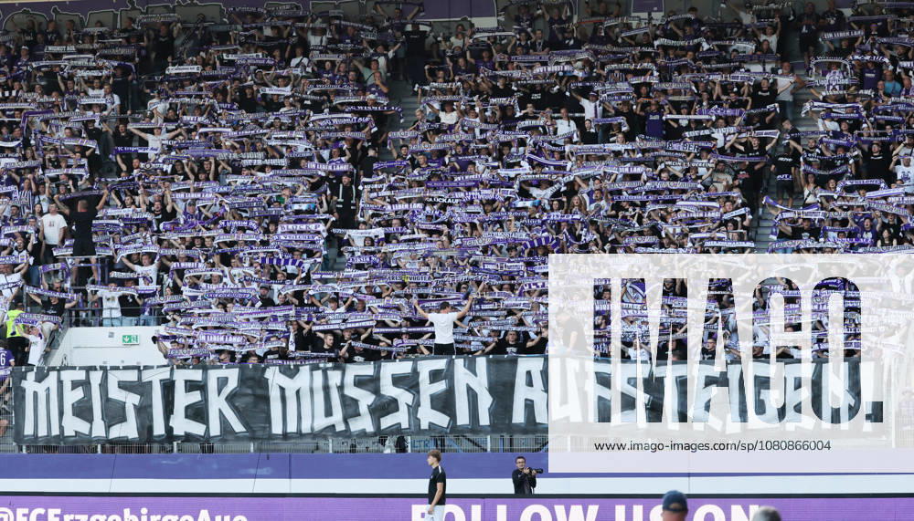Aue, August 6, 2026, Erzgebirgsstadion, Soccer, Regionalliga, Matchday 1: FC Erzgebirge Aue vs. Berliner FC Dynamo, Pictured: Protest against the stalled efforts toward Regional League reform; Erzgebirge Aue fans display a banner, For editorial use only, DFB and NOFV regulations prohibit any use of photographs as image sequences and or quasi-video, Picture Point