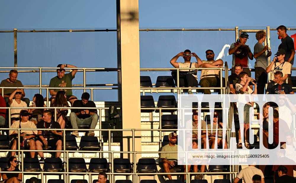 Paris Saint-Germain v Aston Villa - UEFA Super Cup SALZBURG, AUSTRIA - AUGUST 12: Fans are seen at tribune as some wearing protective solar viewing glasses to observe the partial solar eclipse ahead of the UEFA Super Cup match between Paris Saint-Germain and Aston Villa in Salzburg, Austria, on August 12, 2026. Harun Ozalp Anadolu Salzburg Austria. Editorial use only. Please get in touch for any other usage.