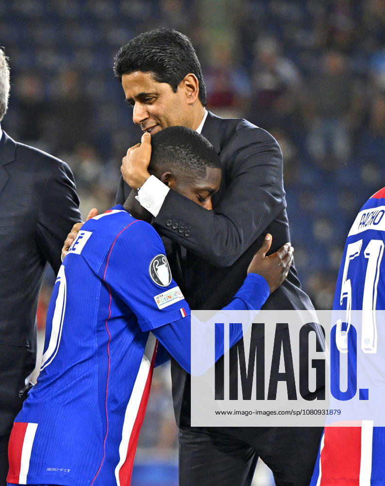 2026 UEFA Super Cup Final in Salzburg, Austria, Paris Saint-Germain vs. Aston Villa, at the Red Bull Arena in Wals near Salzburg; President Nasser Al Khelaifi of Paris Saint-Germain hugs Ousmane Dembélé of Paris Saint-Germain FC