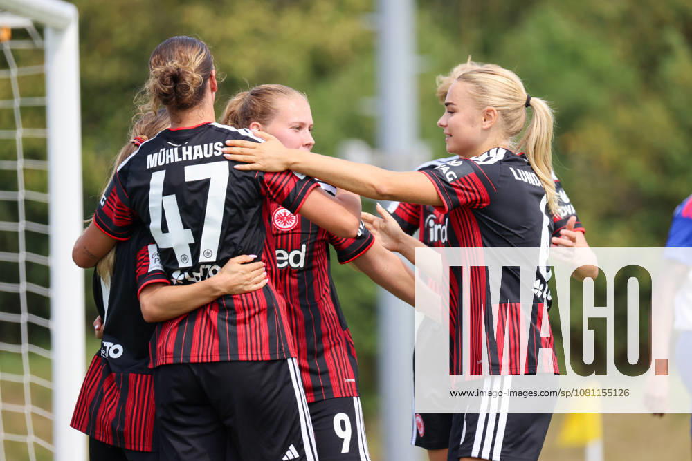 Herzogenaurach, Germany, August 16, 2026: Friendly match between Olympique Lyon Women and Eintracht Frankfurt Women. Pictured from left: Goal scorer Larissa Mühlhaus (SGE) scores the 1–0 goal for Frankfurt. Goal scorer Larissa Mühlhaus (SGE) scores the 1–0 goal for Frankfurt and celebrates with her teammates