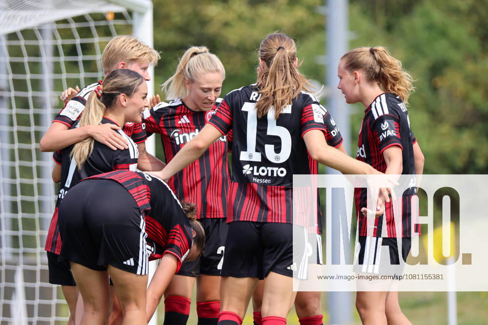 Friendly Match: Olympique Lyon Women vs. Eintracht Frankfurt Women Pictured: Goal scorer Larissa Mühlhaus (SGE), bends down and scores the 1–0 goal for Frankfurt. Goal scorer Larissa Mühlhaus (SGE) scores the 1–0 goal for Frankfurt and celebrates with her teammates