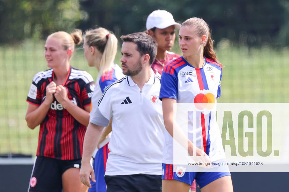 Herzogenaurach, Germany, August 16, 2026: Friendly match between Olympique Lyon Women and Eintracht Frankfurt Women. Pictured, from left: Assistant Head Coach Jonathan Giraldez (Lyon) and Jule Brand (Lyon)