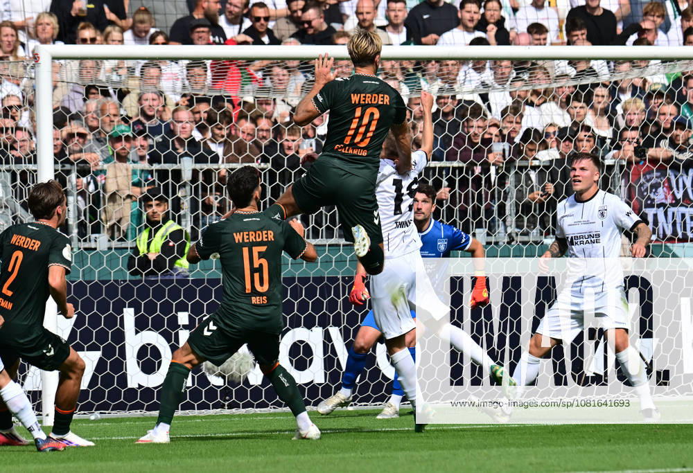 German Soccer, Men s, DFB Cup, 1st Round, 2026–2027 Season, Hamburg, Lüneburger SK vs. Werder Bremen: Niclas Füllkrug (Werder 10) attempts to score a goal past goalkeeper Tommy Henze (Pauli 01). DFB and DFL regulations prohibit any use of photographs as image sequences and or quasi-video. Hamburg Millerntor Stadium, Hamburg, Germany