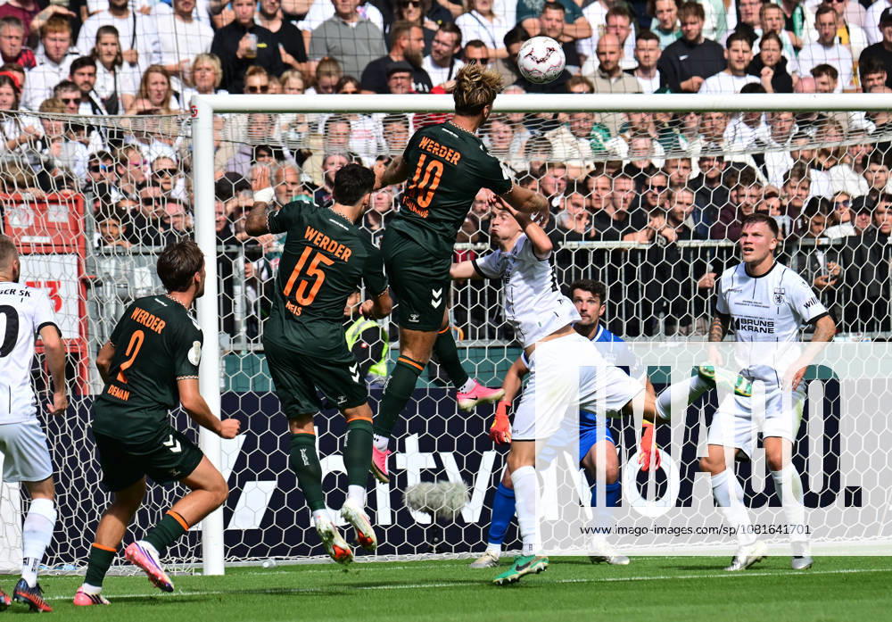 German Soccer, Men s, DFB Cup, 1st Round, 2026–2027 Season, Hamburg, Lüneburger SK vs. Werder Bremen: Niclas Füllkrug (Werder 10) attempts to score a goal past goalkeeper Tommy Henze (Pauli 01). DFB and DFL regulations prohibit any use of photographs as image sequences and or quasi-video. Hamburg Millerntor Stadium, Hamburg, Germany