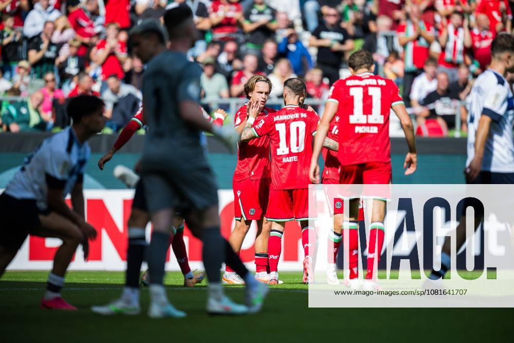 Soccer, 2026–2027, DFB Cup, 1st Round, SV Hemelingen vs. Hannover 96, L R Lars Gindorf; Hannover celebrates after his goal to make it 0–2 with Marcel Hartel, Hannover; Benedikt Pichler, Hannover. DFB regulations prohibit any use of photographs as image sequences and or quasi-video.