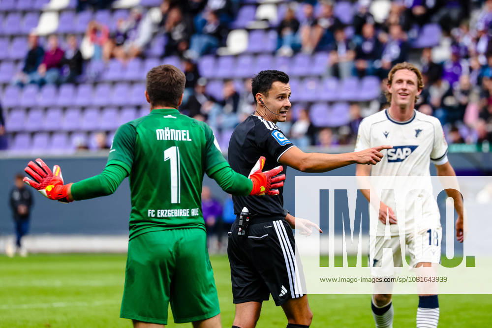 Martin Maennel of FC Erzgebirge Aue, No. 01, protests the call on the goal (0-3), Konrad Oldhafer, referee; DFB gives instructions and gestures; FC Erzgebirge Aue vs. TSG Hoffenheim; soccer; DFB Cup; Round 1; 2026–2027 season, August 22, 2026, DFL regulations prohibit any use of photographs as image sequences and or quasi-video, FC Erzgebirge Aue vs. TSG Hoffenheim, soccer, DFB Cup, Round 1, 2026–2027 Season, August 22, 2026, Aue