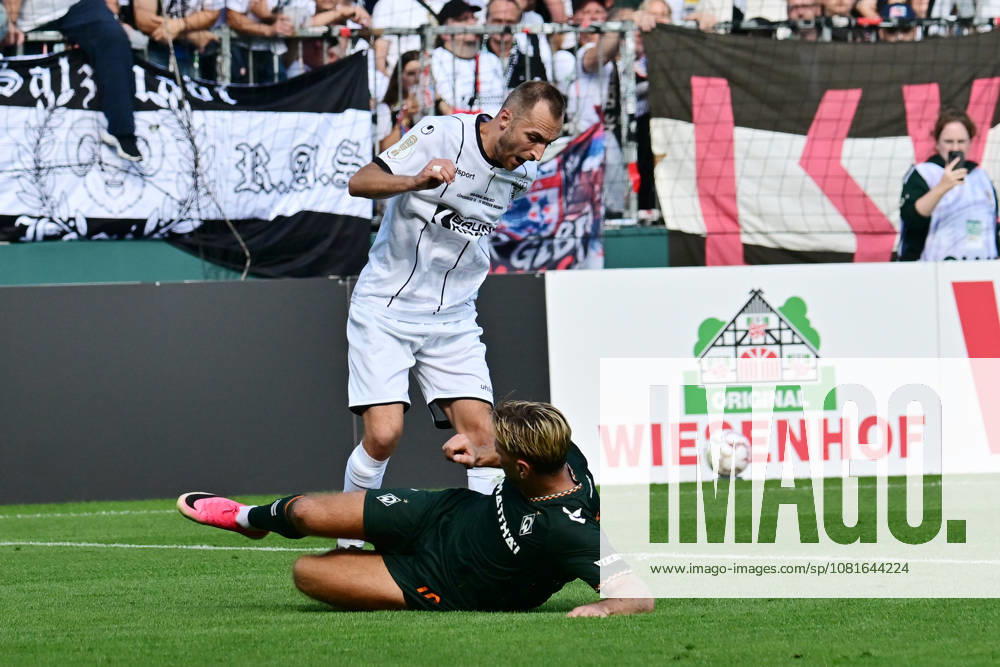 German Soccer, Men, DFB Cup, 1st Round, 2026–2027 Season, Hamburg, Lüneburger SK vs. Werder Bremen: Niclas Füllkrug (Werder, No. 10) fouls Marian Kunze (Lüneburg, No. 10) and receives a yellow card. DFB and DFL regulations prohibit any use of photographs as image sequences and or quasi-video. Hamburg Millerntorstadion, Hamburg, Germany