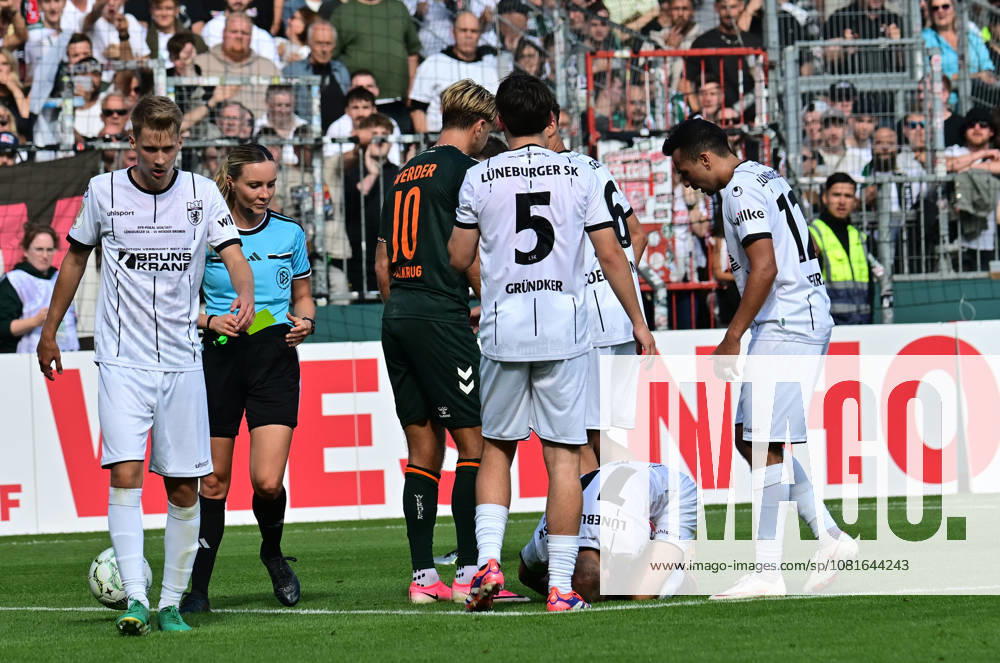German Soccer, Men, DFB Cup, 1st Round, 2026–2027 Season, Hamburg, Lüneburger SK vs. Werder Bremen: Niclas Füllkrug (Werder, No. 10) fouls Marian Kunze (Lüneburg, No. 10) and receives a yellow card. DFB and DFL regulations prohibit any use of photographs as image sequences and or quasi-video. Hamburg Millerntorstadion, Hamburg, Germany