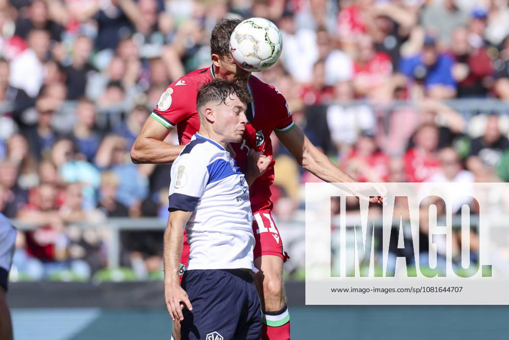 Kerem Sahan of SV Hemelingen and Jean Hugonet of Hannover 96 battle for the ball during the DFB Cup match between SV Hemelingen and Hannover 96 at Weserstadion on August 22, 2026, in Bremen, Germany. Photo by Marco Steinbrenner, DeFodi Images. Kerem Sahan of SV Hemelingen and Jean Hugonet of Hannover 96 battle for the ball during the DFB Cup match between SV Hemelingen and Hannover 96 at Weserstadion on August 22, 2026 in Bremen, Germany. Photo by Marco Steinbrenner, DeFodi Images. Photo by Marco Steinbrenner, DeFodi Images.