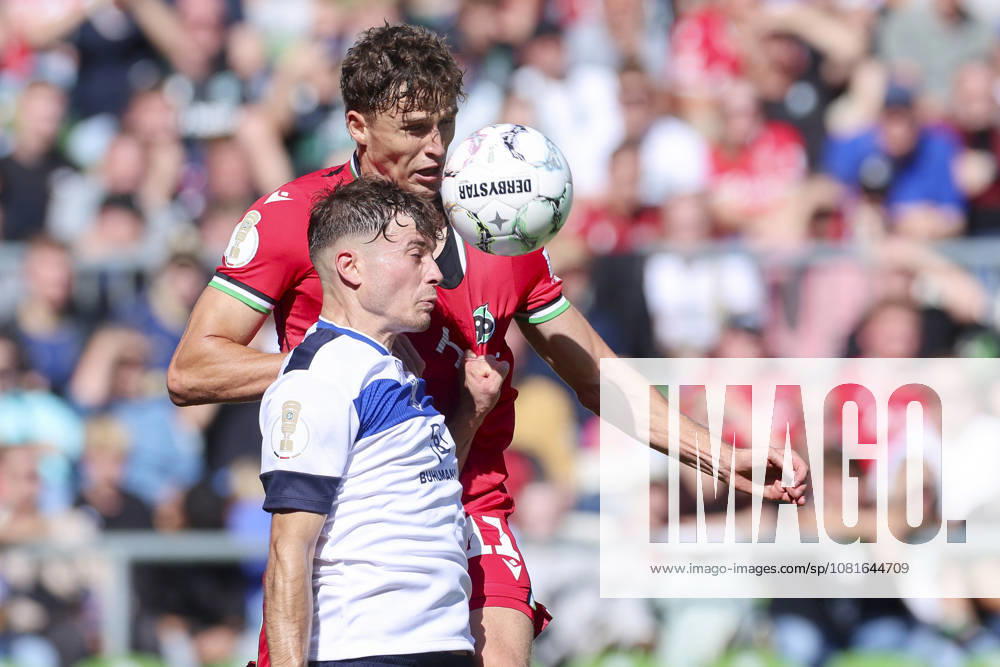 Kerem Sahan of SV Hemelingen and Jean Hugonet of Hannover 96 battle for the ball during the DFB Cup match between SV Hemelingen and Hannover 96 at Weserstadion on August 22, 2026, in Bremen, Germany. Photo by Marco Steinbrenner, DeFodi Images. Kerem Sahan of SV Hemelingen and Jean Hugonet of Hannover 96 battle for the ball during the DFB Cup match between SV Hemelingen and Hannover 96 at Weserstadion on August 22, 2026 in Bremen, Germany. Photo by Marco Steinbrenner, DeFodi Images. Photo by Marco Steinbrenner, DeFodi Images.