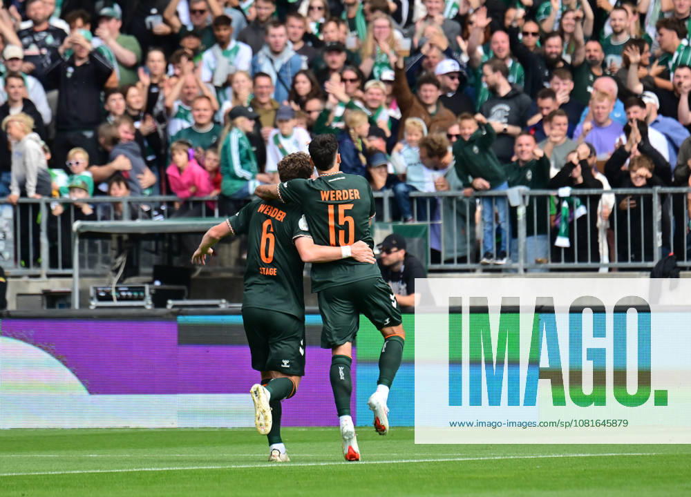 German Soccer, Men s, DFB Cup, 1st Round, 2026–2027 Season, Hamburg, Lüneburger SK vs. Werder Bremen: Jens Stage (Werder 06) scores the 1–0 goal for Bremen past goalkeeper Tommy Henze (Pauli 01) and celebrates with the fans. DFB and DFL regulations prohibit any use of photographs as image sequences and or quasi-video. Hamburg Millerntorstadion, Hamburg, Germany