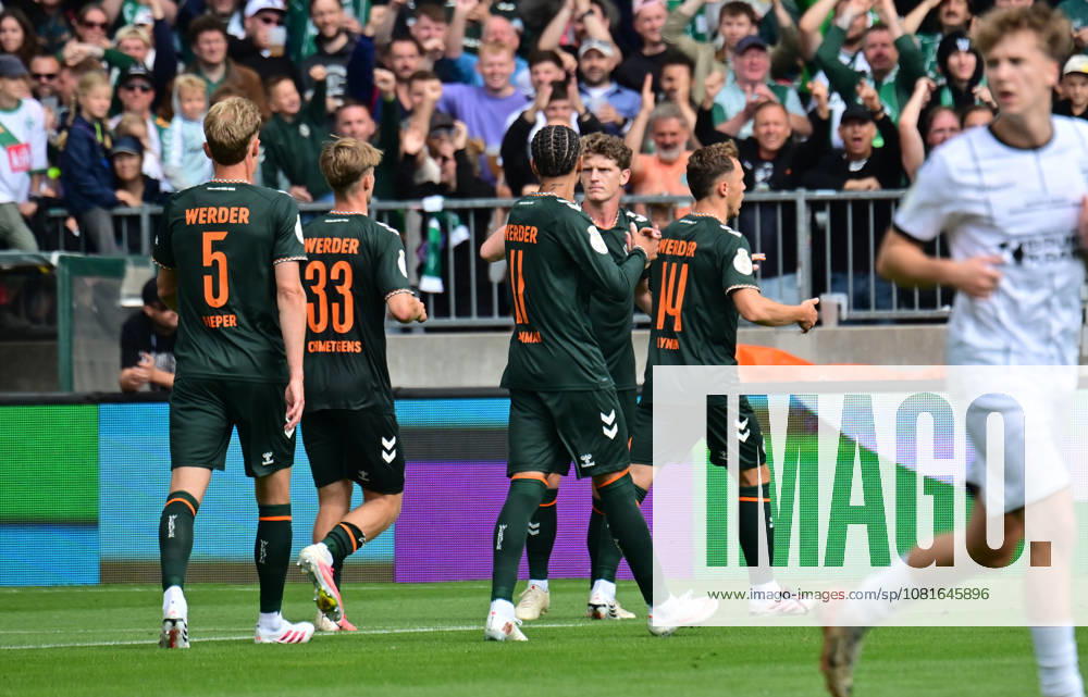German Soccer, Men, DFB Cup, 1st Round, 2026–2027 Season, Hamburg, Lüneburger SK vs. Werder Bremen: Jens Stage (Werder 06) scores the 1–0 goal for Bremen past goalkeeper Tommy Henze (Pauli 01) and celebrates with the team. DFB and DFL regulations prohibit any use of photographs as image sequences and or quasi-video. Hamburg Millerntorstadion, Hamburg, Germany