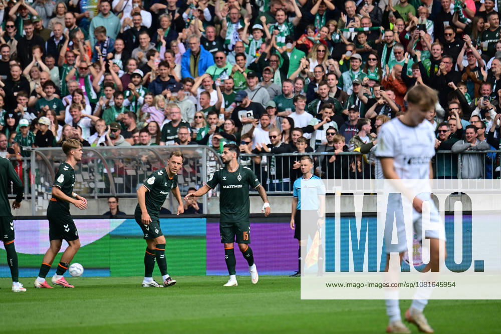 German Soccer, Men, DFB Cup, 1st Round, 2026–2027 Season, Hamburg, Lüneburger SK vs. Werder Bremen: Jens Stage of Werder 06 scores the 1–0 goal for Bremen past goalkeeper Tommy Henze of Pauli 01 and celebrates with the team. DFB and DFL regulations prohibit any use of photographs as image sequences and or quasi-video. Hamburg Millerntorstadion, Hamburg, Germany