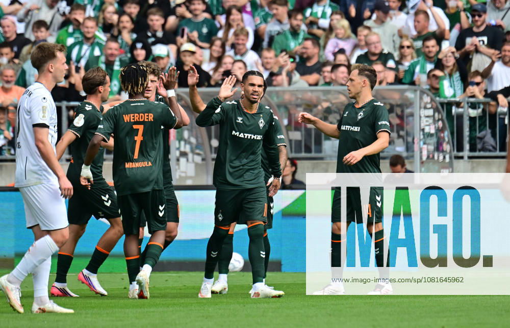 German Soccer, Men, DFB Cup, 1st Round, 2026–2027 Season, Hamburg, Lüneburger SK vs. Werder Bremen: Jens Stage of Werder 06 scores the 1–0 goal for Bremen past goalkeeper Tommy Henze of Pauli 01 and celebrates with the team. DFB and DFL regulations prohibit any use of photographs as image sequences and or quasi-video. Hamburg Millerntorstadion, Hamburg, Germany