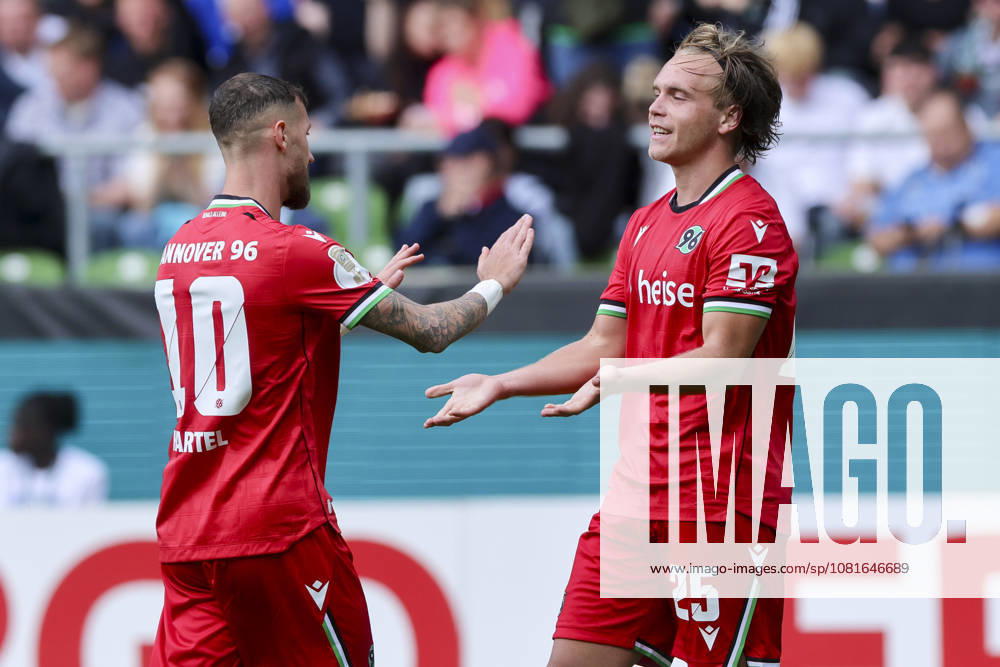 Lars Gindorf of Hannover 96 celebrates his goal—making the score 0–7—with Marcel Hartel of Hannover 96 during the DFB Cup match between SV Hemelingen and Hannover 96 at Weserstadion on August 22, 2026, in Bremen, Germany Photo by Marco Steinbrenner, DeFodi Images Lars Gindorf of Hannover 96 celebrates after scoring his team’s seventh goal with Marcel Hartel of Hannover 96 during the DFB Cup match between SV Hemelingen and Hannover 96 at Weserstadion on August 22, 2026, at the Weserstadion in Bremen, Germany. Photo by Marco Steinbrenner, DeFodi Images. Photo by Marco Steinbrenner, DeFodi Images.