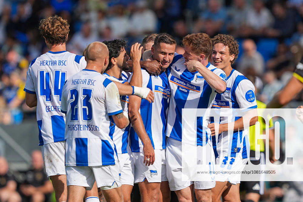 Soccer, DFB Cup, 1. FC Saarbrücken vs. Hertha BSC, 2026–2027 season, Ludwigsparkstadion: Goal celebration after Hertha BSC SC’s 1–0 goal scored by Paul Seguin (Hertha BSC, 30), along with Jon Dagur Thorsteinsson (Hertha BSC, 23) and Sebastian Groenning Andersen (Hertha BSC, 17. DFB regulations prohibit any use of photographs as image sequences and or quasi-video