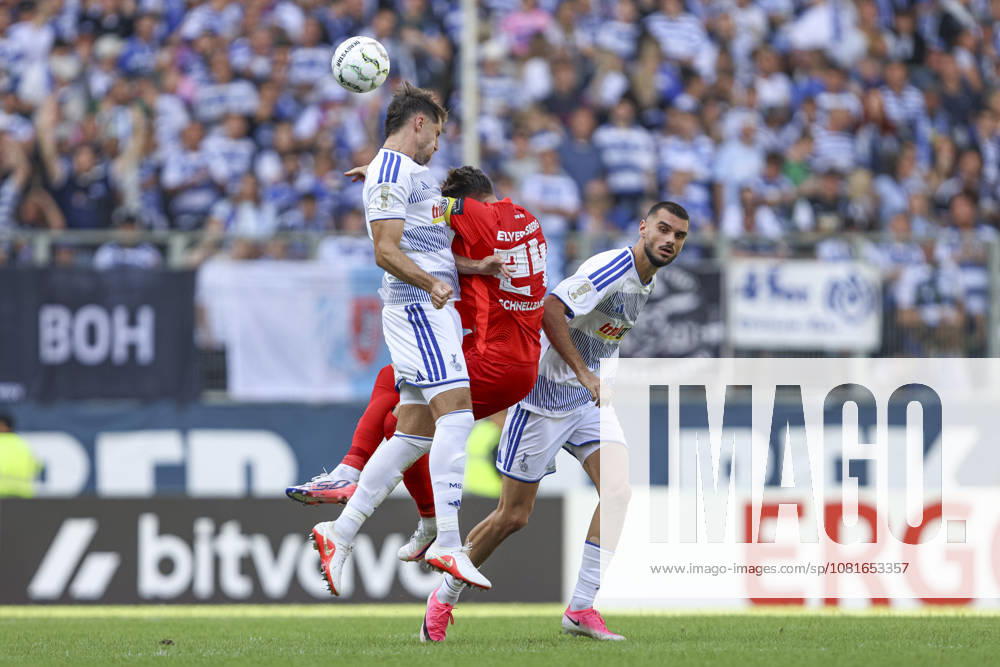 Lex Tyger Lobinger of MSV Duisburg, Luca Schnellbacher of SV 07 Elversberg, and Rasim Bulic of MSV Duisburg in a tackle during the first-round DFB Cup match between MSV Duisburg and SV 07 Elversberg, Schauinsland Reisen Arena on August 22, 2026, in Duisburg, Germany. Photo by Oliver Kaelke, DeFodi Images. Lex Tyger Lobinger of MSV Duisburg, Luca Schnellbacher of SV 07 Elversberg, and Rasim Bulic of MSV Duisburg battle for the ball during the first-round match of the DFB Cup between MSV Duisburg and SV 07 Elversberg at Schauinsland Reisen Arena on August 22, 2026 in Duisburg, Germany Photo by Oliver Kaelke, DeFodi Images DFB and DFL regulations prohibit any use of photographs as image sequences and or quasi-video. Photo by Oliver Kaelke, DeFodi Images