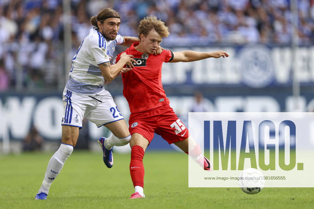 Joshua Bitter of MSV Duisburg and Cole Campbell of SV 07 Elversberg in a tackle during the first-round DFB Cup match between MSV Duisburg and SV 07 Elversberg, Schauinsland Reisen Arena on August 22, 2026, in Duisburg, Germany. Photo by Oliver Kaelke, DeFodi Images. Joshua Bitter of MSV Duisburg and Cole Campbell of SV 07 Elversberg battle for the ball during the first-round match of the DFB Cup between MSV Duisburg and SV 07 Elversberg at Schauinsland Reisen Arena on August 22, 2026 in Duisburg, Germany. Photo by Oliver Kaelke, DeFodi Images. DFB and DFL regulations prohibit any use of photographs as image sequences and or quasi-video. Photo by Oliver Kaelke, DeFodi Images.